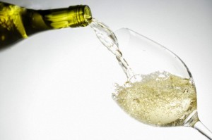 White wine pouring into glass